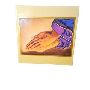 Grander images praying hands tile display.